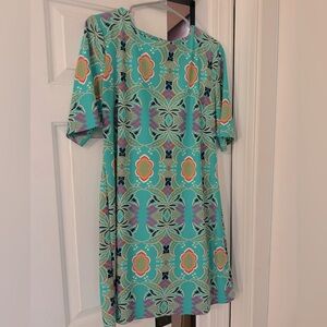 Boutique summer dress with bright print. Light weight
